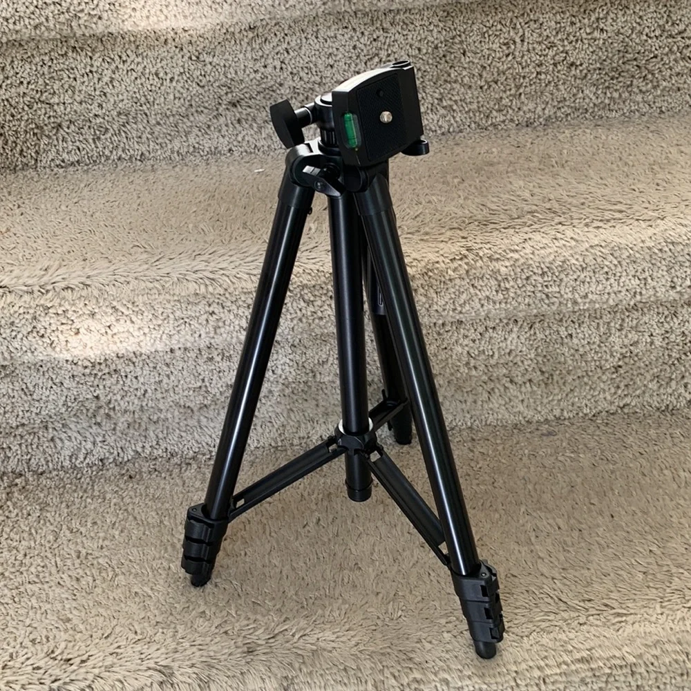 Tripod stand only. Black, adjustable.